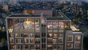 Phối cảnh The Westique Residences về đêm với mảng xanh và tiện ích trên tầng thượng