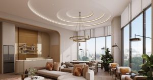 Phòng khách căn hộ mẫu The Westique Residences với cửa kính lớn nhìn ra thành phố